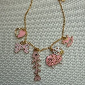Adorable Pink and Gold Charm Bracelet